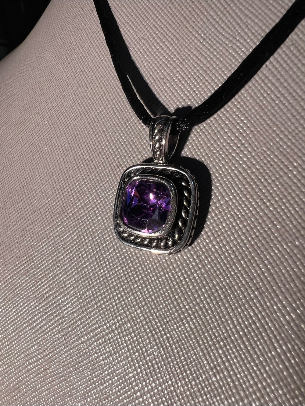 Silvertone Amethyst Pendant read more
